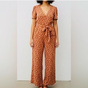 Ivy City Co Terracotta Leaf Patterned Jumpsuit - Size Small